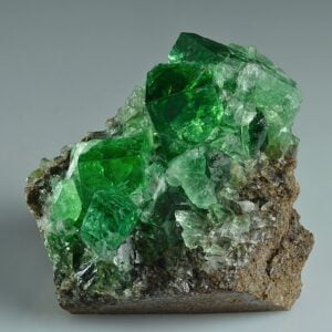 Green fluorite twinned crystals on matrix found from Diana Maria mine, Rogerley quarry, Stanhope, County Durham, England